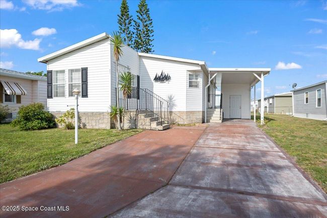 641 Hyacinth Cir, House other with 2 bedrooms, 2 bathrooms and null parking in Barefoot Bay FL | Image 22