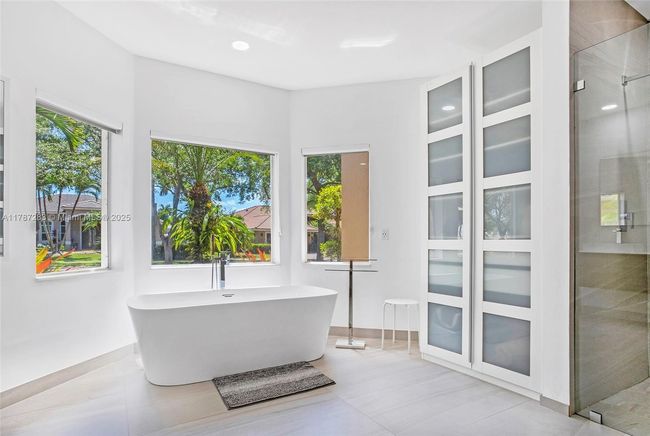 3848 Oak Ridge Cir, House other with 4 bedrooms, 3 bathrooms and null parking in Weston FL | Image 49