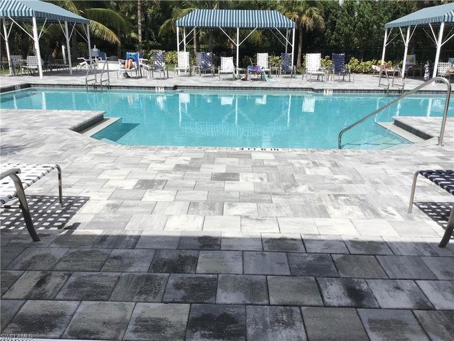 Pool area also has spa/hot tub and fire pit | Image 24