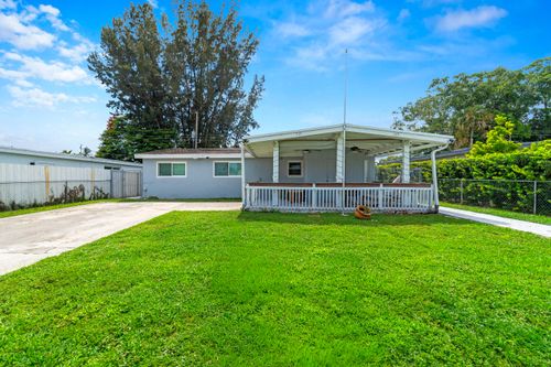 735 Hibiscus Dr, Royal Palm Beach, FL, 33411-7623 | Card Image