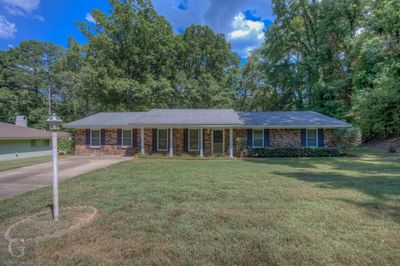 Ranch-style home with a front lawn | Image 2