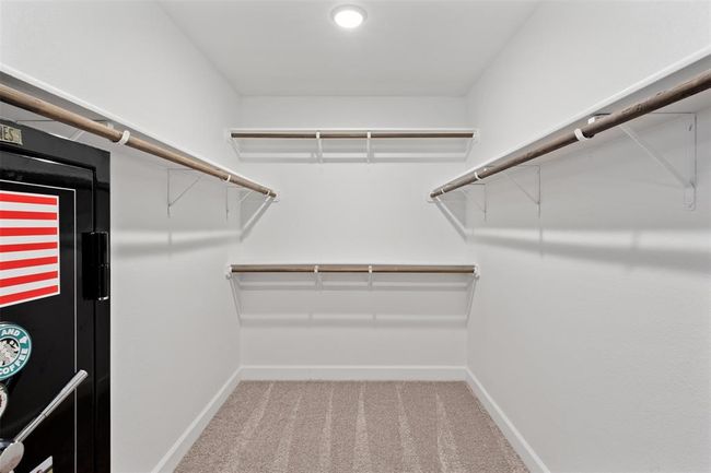 Walk-in primary closet | Image 31