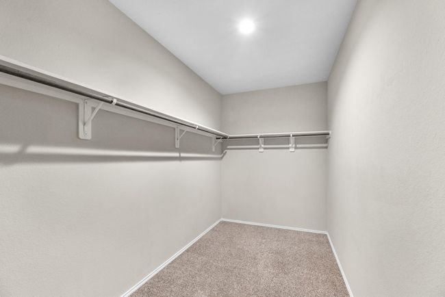 This primary closet is vast and spacious. | Image 31