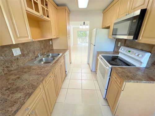 206-8450 Lagos De Campo Blvd, Tamarac, FL, 33321 | Card Image