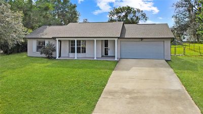 Good-Looking & Affordable Three-Bedroom, Two-Bath, Concrete-Block Single-Family Home with a Two-Car Garage on a Quiet Cul-De-Sac! HOLY COW! | Image 1