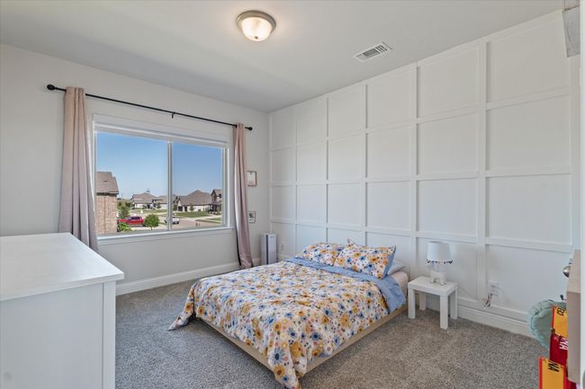 Bedroom featuring carpet and baseboards | Image 30