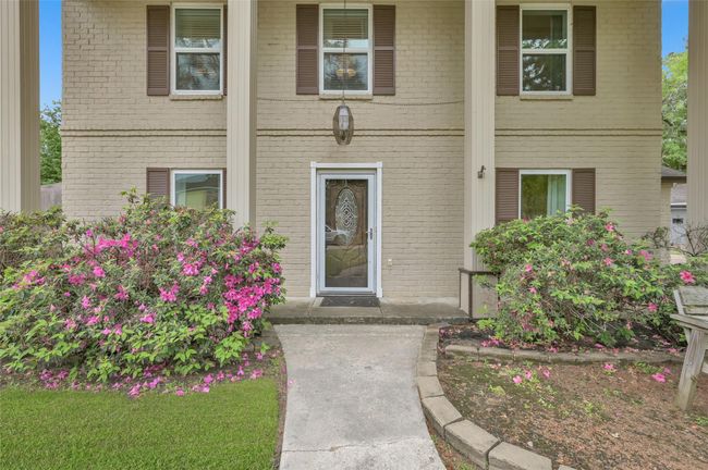 Front Yard has established Azaela bushes, mature trees and a covered porch for enjoying pleasant days. The seller is even going to leave the park bench for you! | Image 30
