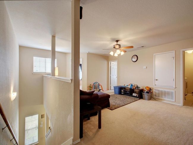Staged earlier. Carpet replaced with Laminate flooring | Image 21