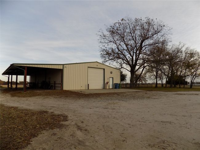 Covered Storage Area, Garage Door and Entry Door | Image 27