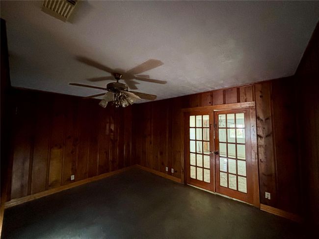 3rd bedroom downstairs entrance to garage | Image 18
