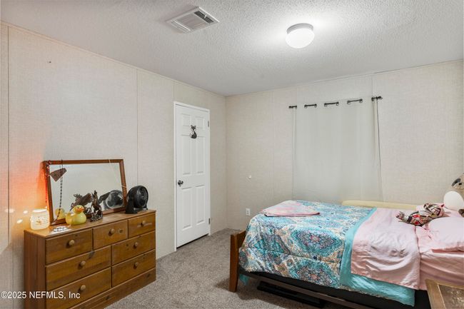 Bedroom 1 with walk-in closet | Image 10