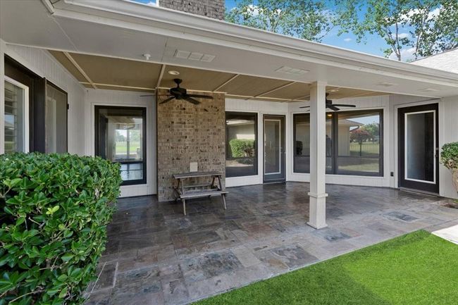 View of patio / terrace featuring ceiling fan | Image 39