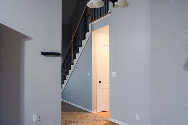 Stairway featuring baseboards | Image 6