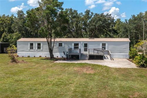 8930 Hammock Loop, POLK CITY, FL, 33868-9497 | Card Image