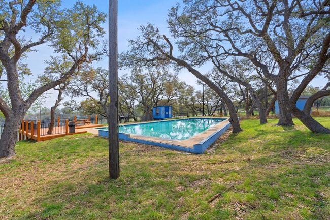 Another view of the community pool with rest rooms/changing rooms | Image 35