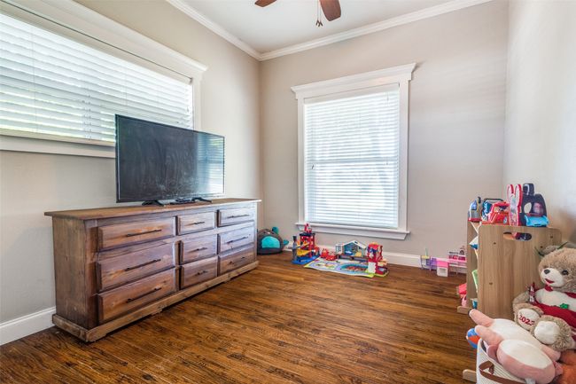 The secondary downstairs bedroom is | Image 15