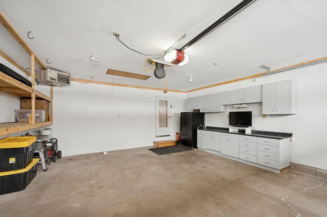 Attached insulated and heated two car garage! | Image 38