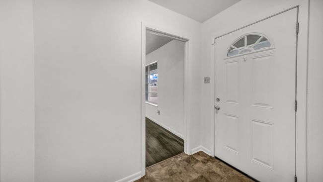 View of entrance foyer with coat closet | Image 4