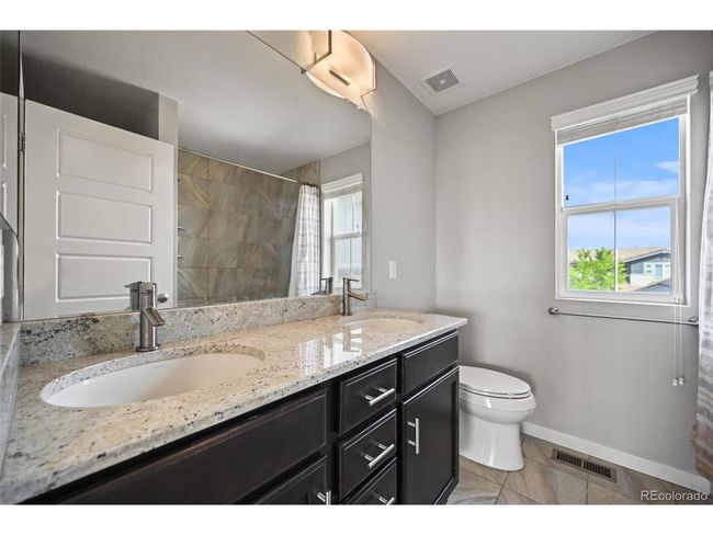 10934 Touchstone Loop, House other with 4 bedrooms, 4 bathrooms and null parking in Parker CO | Image 29