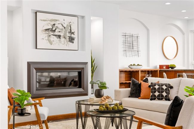 Designed for both comfort and entertaining with a fireplace. | Image 10