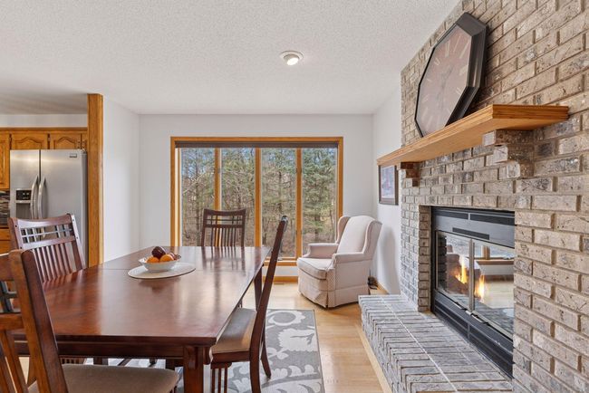 Featuring a relaxing wood burning fireplace | Image 19