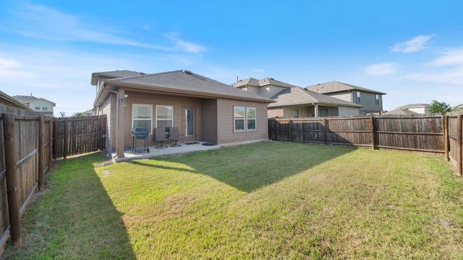 Back of property featuring a patio area and a fenced backyard | Image 26