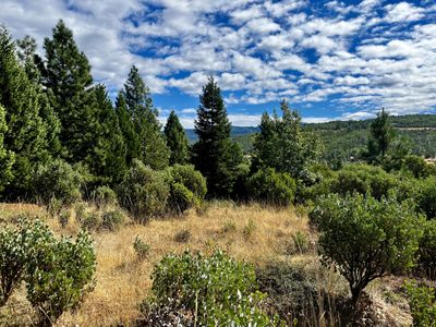 Level potential build site near quonset hut with view | Image 3