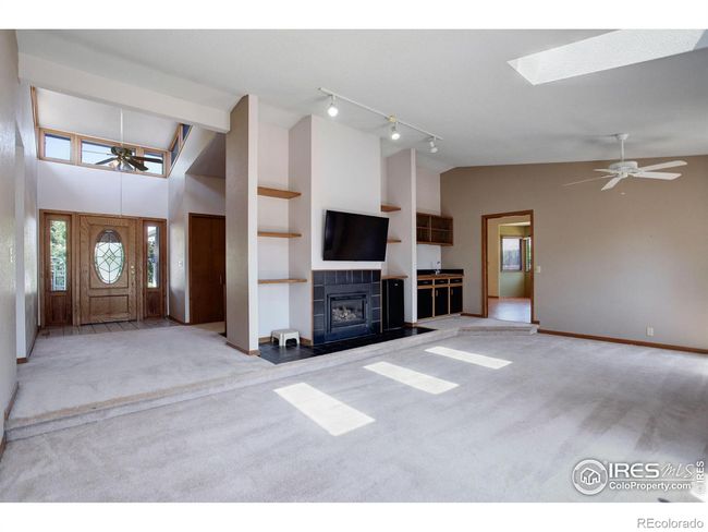 family room with fireplace | Image 17