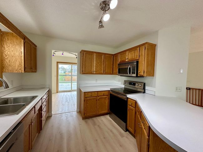 14210 Tungsten St Nw, House other with 3 bedrooms, 2 bathrooms and null parking in Ramsey MN | Image 10