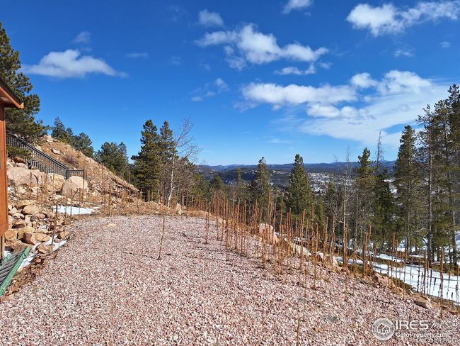 Stairway to the left in pic goes to upper driveway area | Image 15