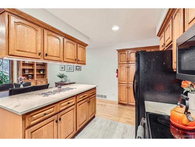 8845 W 81 St Dr, House other with 4 bedrooms, 3 bathrooms and null parking in Arvada CO | Image 8