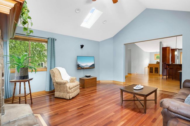 Delight in the details of this home as natural light pours in through the sky lights overhead. | Image 15