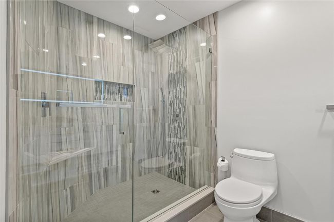 Master shower tiled from floor to ceiling | Image 46