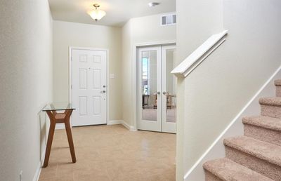 Welcoming entry way *Photos of furnished model. Not actual home. Representative of floor plan. Some options and features may vary. | Image 3