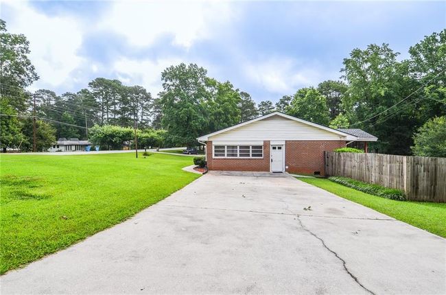 879 Old Tucker Rd, House other with 3 bedrooms, 2 bathrooms and 2 parking in Stone Mountain GA | Image 58