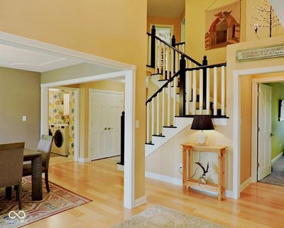 Foyer, dining room and stairway | Image 2