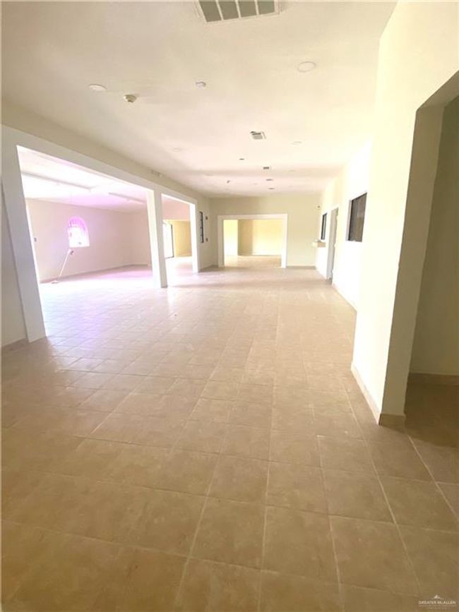 Corridor with light tile floors | Image 19