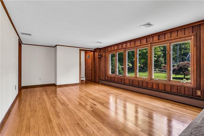 The Front Door enter into a foyer with a coat closet. But, honestly, this is New England, everyojne comes in the side door. | Image 14