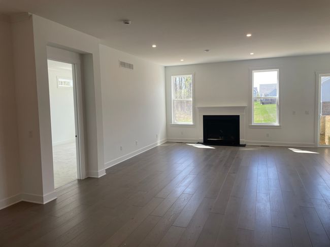 Expansive great room with designer fireplace | Image 9