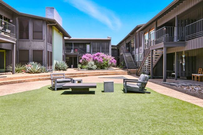 View of community with stairs and a lawn | Image 16