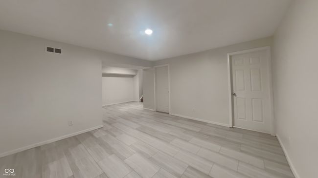 empty room with recessed lighting, visible vents, and baseboards | Image 18