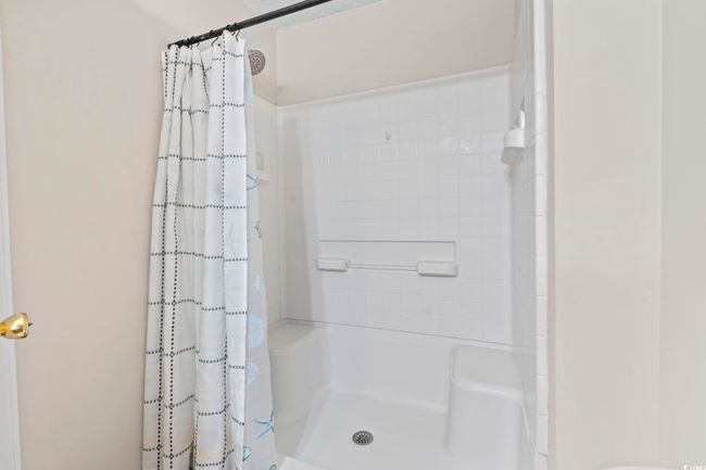 Full bath with a shower with shower curtain | Image 21