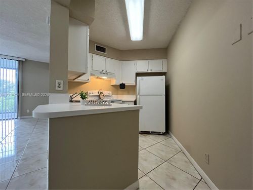 209-212 Lake Pointe Dr, Oakland Park, FL, 33309-3547 | Card Image