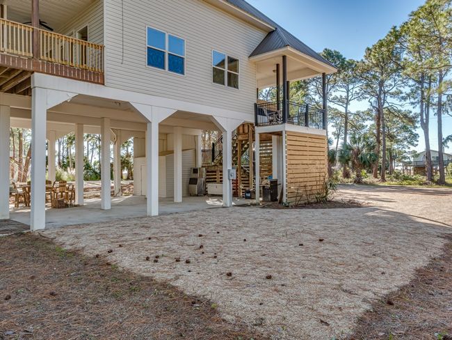 27 Harry Morrison Island Dr, House other with 3 bedrooms, 2 bathrooms and 3 parking in Alligator Point FL | Image 5