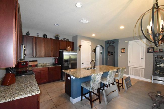 709 Calabria Way, House other with 3 bedrooms, 3 bathrooms and null parking in HOWEY IN THE HILLS FL | Image 7