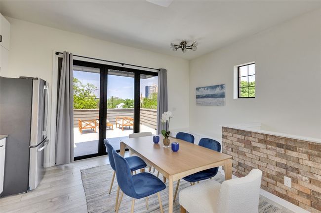 Dining area featuring light wood-type flooring | Image 25