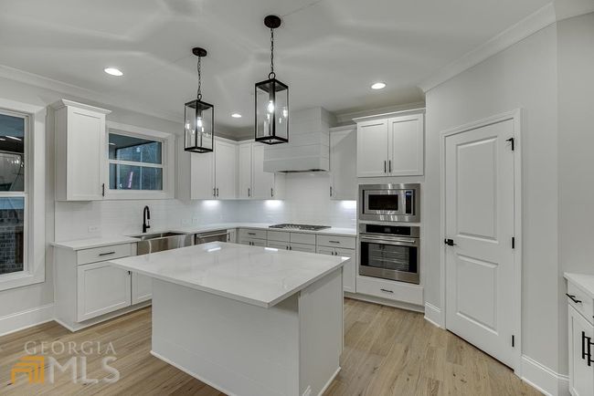 7030 Majors Rd, House other with 5 bedrooms, 3 bathrooms and 4 parking in Cumming GA | Image 19