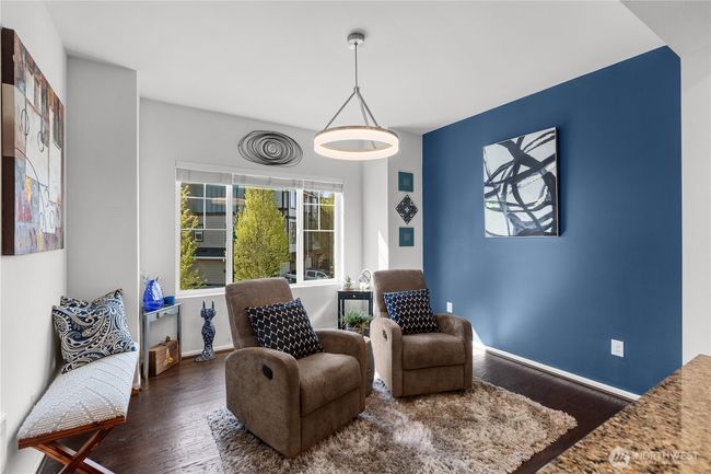 This flexible space is meant to be a dining room but it can also be an extra living space or office area. | Image 6