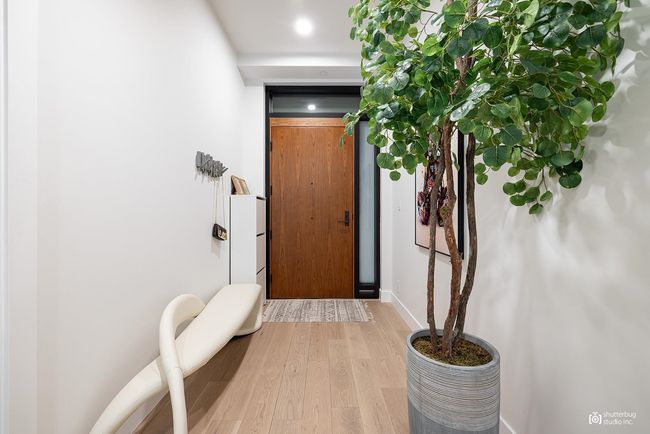 Doorway featuring wood finished floors | Image 19