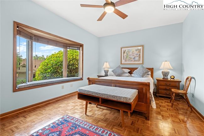 Primary Bedroom has a bay window and hardwood floors | Image 17